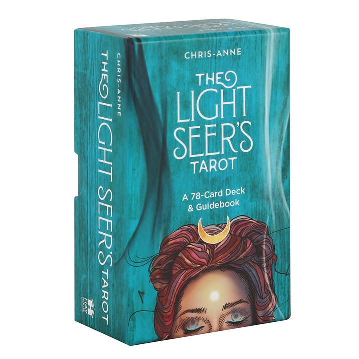 Box of 'The Light Seers Tarot' with a teal color scheme and a face design on a white background.