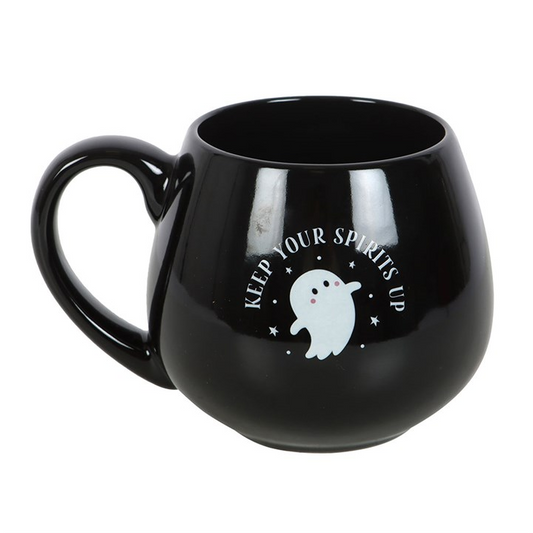 Black mug with ghost design and text on a white background