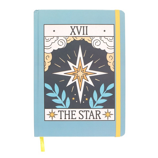 Notebook with star design and 'The Star' tarot card illustration on a white background