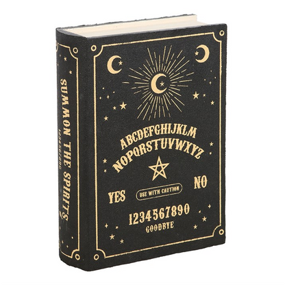 Decorative book with celestial design and text on a white background