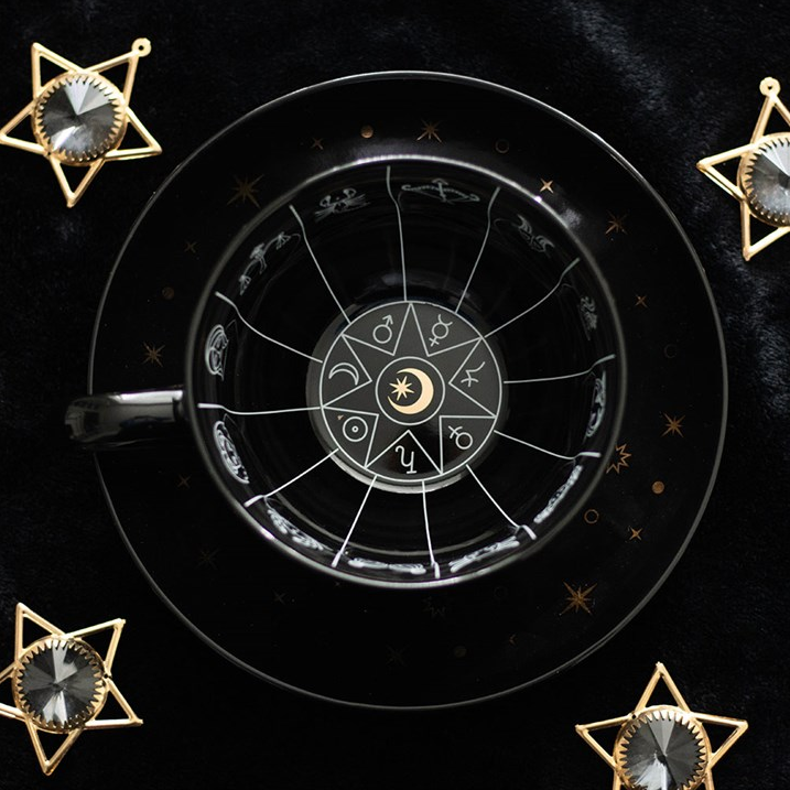 Astrological chart with star symbols on a black background