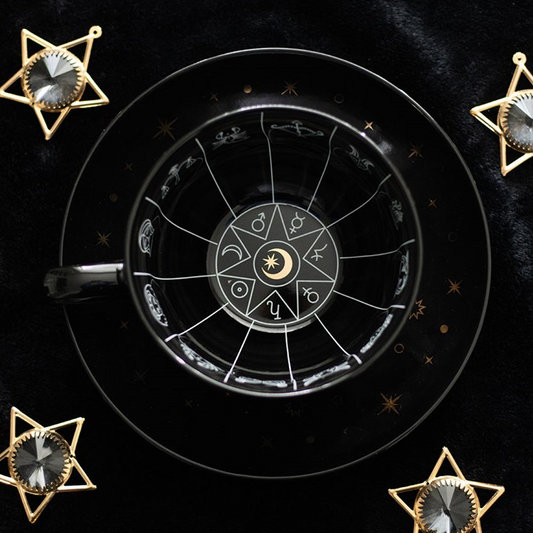Astrological chart with star symbols on a black background