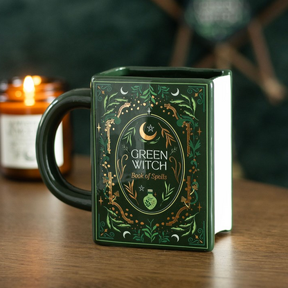 Book-shaped mug with 'Green Witch' design on a wooden surface.