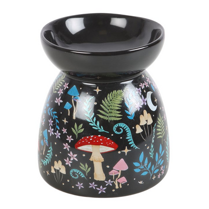 Decorative oil burner with fairy tale design on a white background