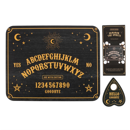 Ouija board set with cards and handle on a white background