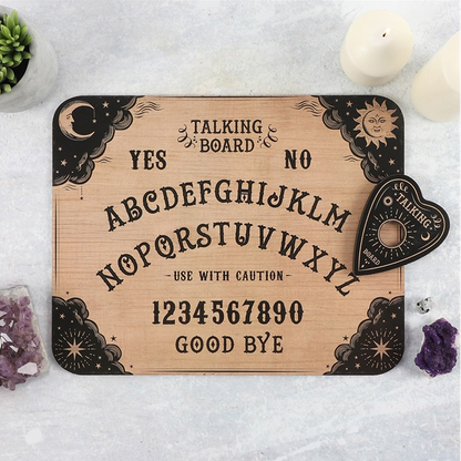 Wooden Ouija board with black text and symbols on a white background