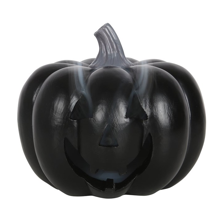 Black pumpkin-shaped container with a face on a white background