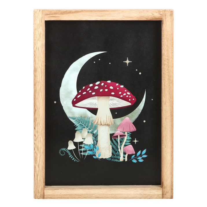 Framed artwork with mushrooms and a moon on a black background