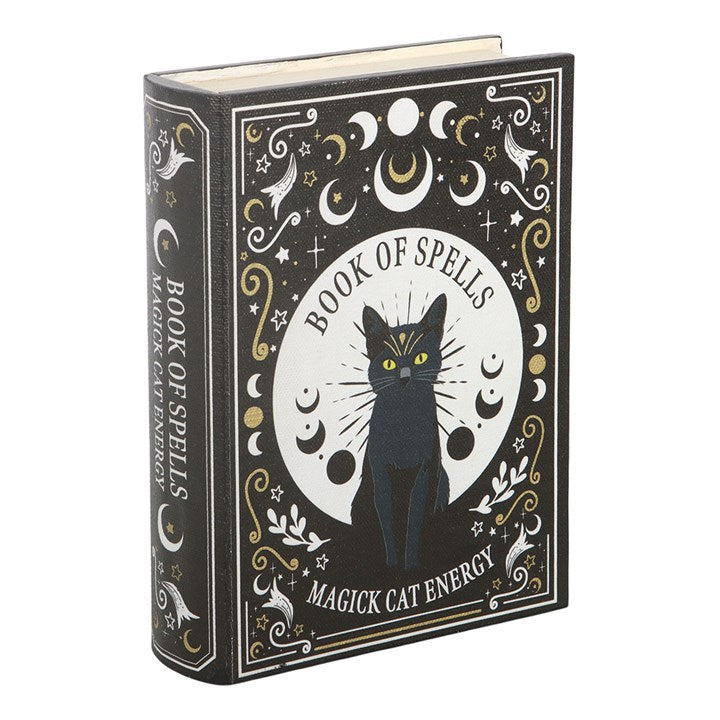 Book titled 'Book of Spells: Magick Cat Energy' with a black cat illustration on a white background