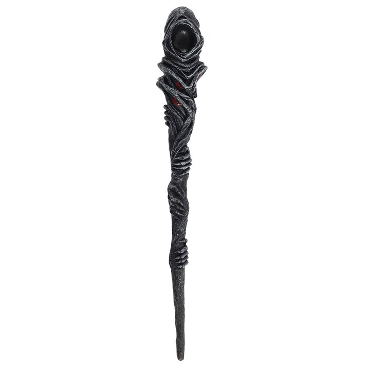 Black decorative staff with intricate design on a white background