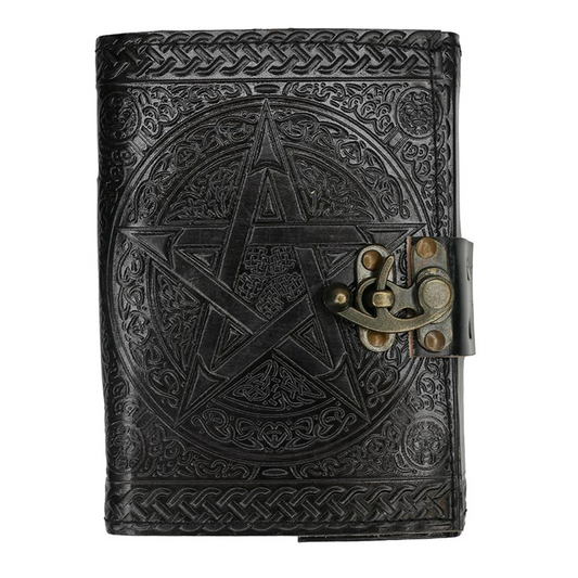 Black leather journal with pentagram design and brass clasp on a white background