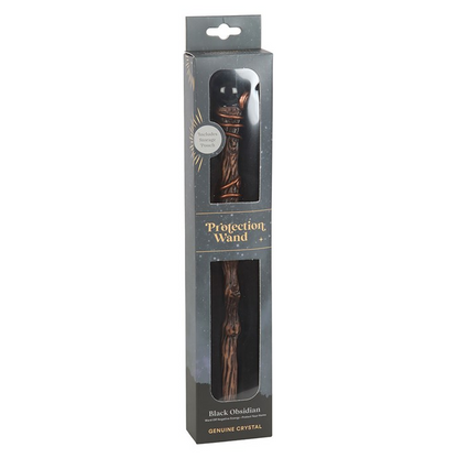 A black wooden procuring wand in its original dark gray retail packaging, shown against a plain white background.