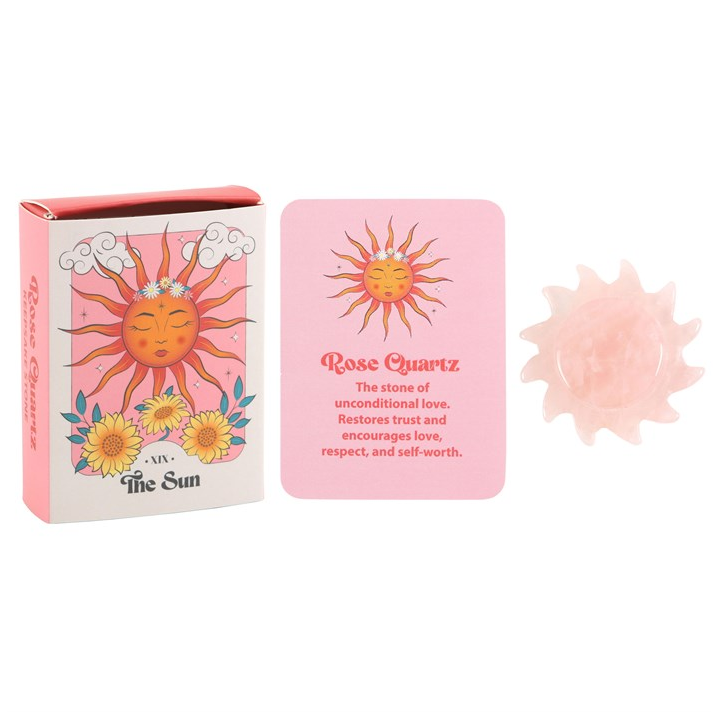 Pink packaging with sun design and text on a white background