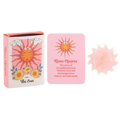 Pink packaging with sun design and text on a white background