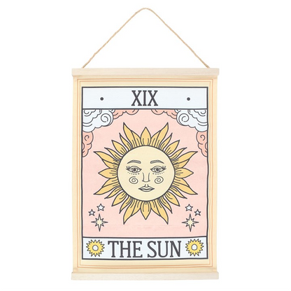 Decorative wall hanging with a sun design and 'The Sun' text on a white background