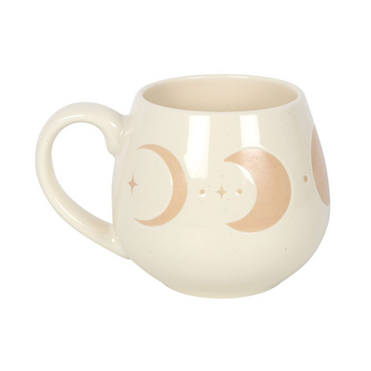White mug with moon phases design on a white background