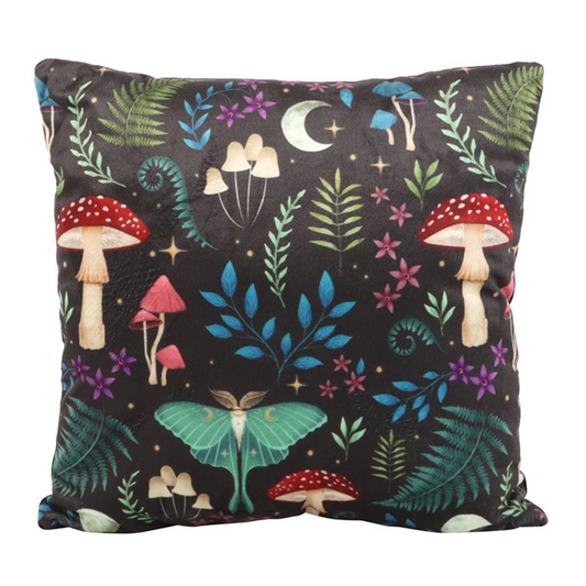 Decorative pillow with fairy tale design featuring mushrooms and fairies on a dark background