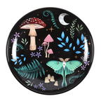 Decorative plate with mushrooms and a butterfly design on a black background