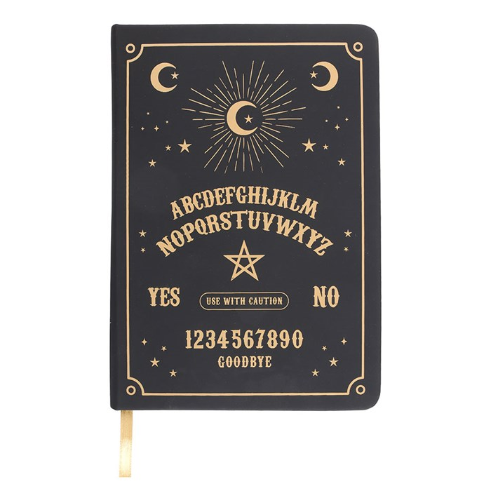 Black notebook with gold lettering and symbols on a white background