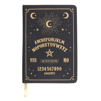 Black notebook with gold lettering and symbols on a white background