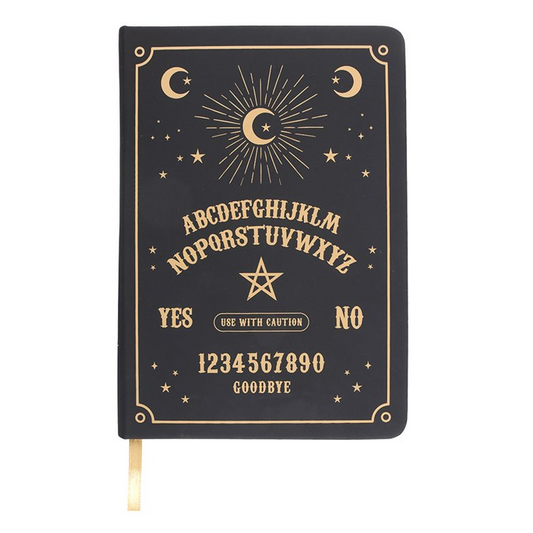 Black notebook with gold lettering and symbols on a white background